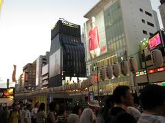 night view of Dotonbori with neon signs and canal