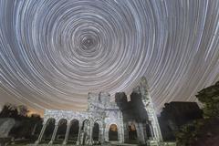 Star trails over old abbey ruins in Co Louth Ireland