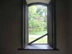 wooden house window with a view of nature