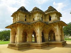 Ruins of Hampi with ancient stone architecture and a landscape with scattered boulders