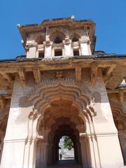 Hampi architecture featuring ancient stone structures and intricate carvings in India