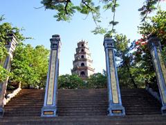 Thiên Mụ Pagoda entrance with four pillars and steps in Hue, Vietnam