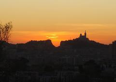 Notre-Dame de la Garde hill silhouette at sunset in winter