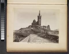 View of Notre-Dame-de-la-Garde in Marseille from an album with photos of landmarks in Italy and South France