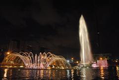 Fonte da Torre in Brasília at night with illuminated fountain