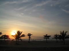 sunset over Caraguatatuba beach with colorful sky