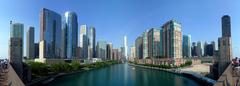 Panoramic view of the Chicago River with Trump International Hotel and Tower, Mies van der Rohe's 330 North Wabash, and other notable buildings lining the riverbanks