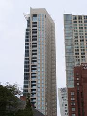 Side view of 50 East Chestnut St in Chicago from Michigan Ave and Delaware Pl