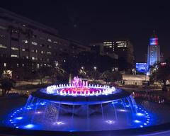 GrandPark LA fountain lit with French tricolour lights