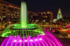 Grand Park at night with illuminated fountain and Los Angeles City Hall