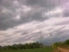 electric poles extending to a village