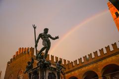 Monument in Italy with a rainbow overhead