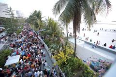 Manila Baywalk Dolomite Beach entrance crowded with visitors on March 19, 2023