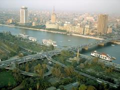 a panoramic view of Cairo city from a high vantage point, highlighting the urban landscape and buildings