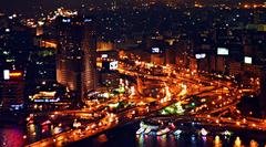 6 October Bridge and Ramses Hilton Hotel in Cairo at night