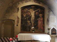 Interior fresco painting at Eremo delle Carceri showing religious artwork