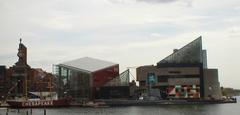 Baltimore National Aquarium exterior at sunset with glass facade