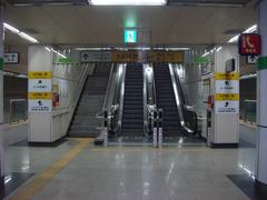 View of Yaksu Station with entrance and signage
