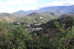 Scenic view of Gatlinburg, Tennessee from the Gatlinburg Bypass with mountains and city in the background on a clear day