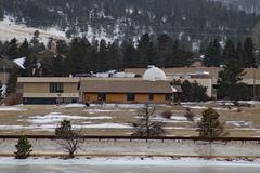 Estes Park Memorial Observatory across Lake Estes at sunset