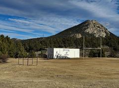 Mt. Olympus mountain with Estes Park High School football field in foreground