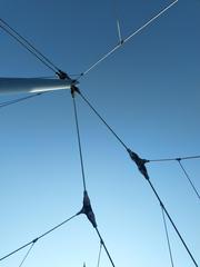 View of the sky with wire ropes of Löwentorbrücke bridge at Löwentorbrücke station in Stuttgart