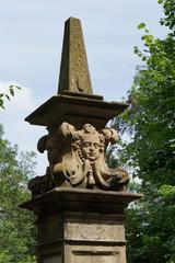 Demmler Monument in Stuttgart with white stone relief and classical sculptures