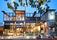 Exterior view of Jackson Lily's Restaurant in Seminyak Bali at dusk with warm lighting and tropical surroundings