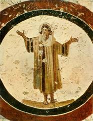 Christian praying in orante position in Rome catacombs