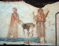Early-Christian painting of Eucharistic bread in Saint Calixte Catacomb