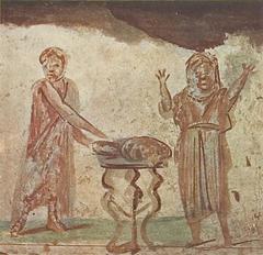 Third-century fresco from the Callistus Catacomb depicting Christ in a philosopher's pallium consecrating bread and fish, symbolizing the Eucharist, with an orans figure beside the tripod.