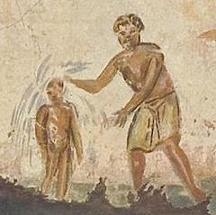 Baptism ceremony inside Saint Calixte church with priest performing baptism