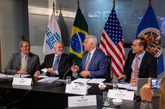 U.S. Chargé d'Affaires Douglas Koneff and Brazilian officials signing the Memorandum of Understanding between Sebrae and OAS for SBDC technology implementation in Brazil