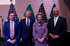 Consul General of the USA in Sao Paulo David Hodge with husband Romano Bezerril, Sao Paulo Municipal Secretary of International Relations Marta Suplicy, and interim chargé d'affaires Douglas Koneff at 4th of July celebration