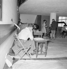 Black and white photo of Kameri theater group rehearsal led by guest director Sam Besekon for the play Galileo by Bertolt Brecht in Israel, 1964