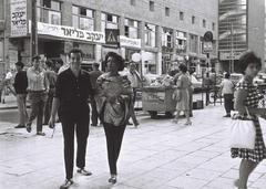 Hazel Scott and husband Adam Clayton Powell Jr. walking on Dizengoff Street in Tel Aviv, December 1962