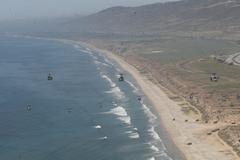 Marine Light Attack Helicopter Training Squadron 303 flying formation over Marine Corps Base Camp Pendleton