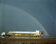 Atlas 93D missile with Rainbow preparing to load aboard C-133B aircraft at Miramar NAS on October 11, 1961