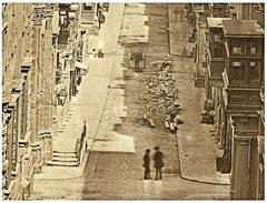 Strada Mercanti street in Valletta with Church of St. James on the left and Palazzo Parisio and Castellania buildings on the right in 1854