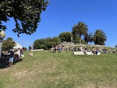 Scenic view of Jardim do Morro park with lush greenery and benches under a clear sky