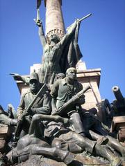 Detail of Peninsular Wars statue in Porto, Portugal showing a soldier's face and helmet