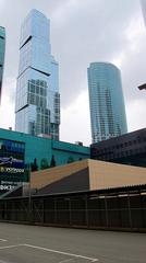 Moscow International Business Center skyline with modern skyscrapers under bright blue sky