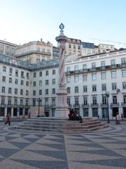 Praça do Município in Lisbon with statue and historic buildings