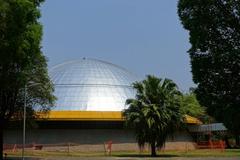 Planetário do Ibirapuera in Ibirapuera Park, Sao Paulo, Brazil under blue sky