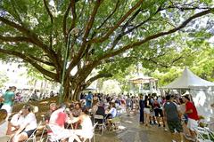 Polo Cervejeiro event at Praça Carlos Gomes with people enjoying craft beer and socializing outdoors