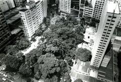 Paribar building and São Paulo city downtown area with high-rise buildings under clear blue sky