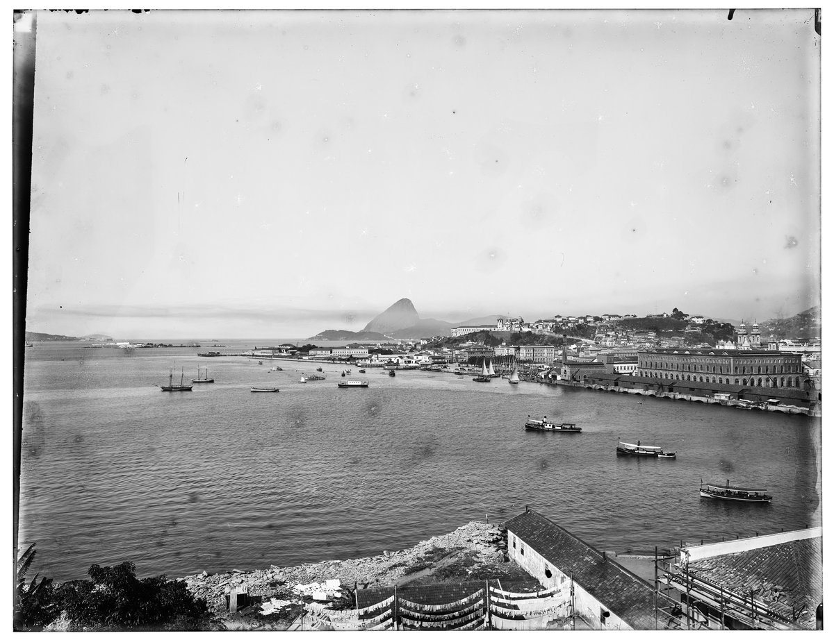 Historic view of Cais Pharoux and Praça D. Pedro II, now Praça XV de Novembro, seen from Ilha das Cobras in Rio de Janeiro