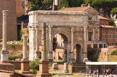 The Arch of Septimius Severus at Forum Romanum with Column of Phocas on the left and Mamertinum on the right in Rome, Italy