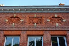 Relief sculptures on the exterior wall of York House in Twickenham London