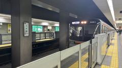 Osaka Metro Series 66 train carriage at a station platform